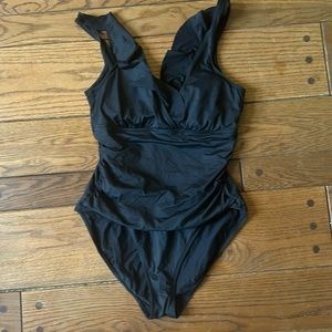 Women’s swimsuits. First three size 10 last suit size 8